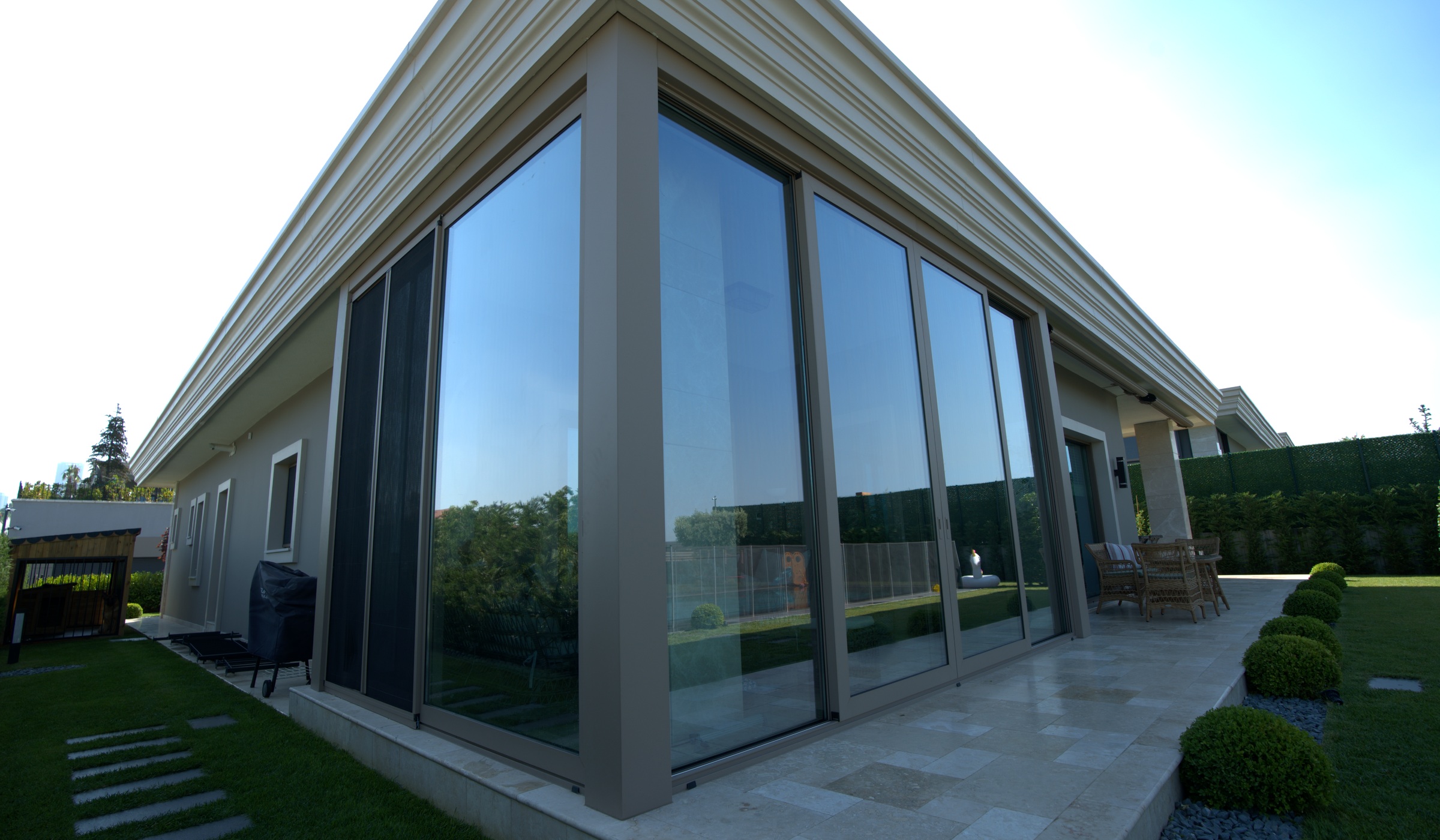 Lift and slide glass facade on a contemporary building