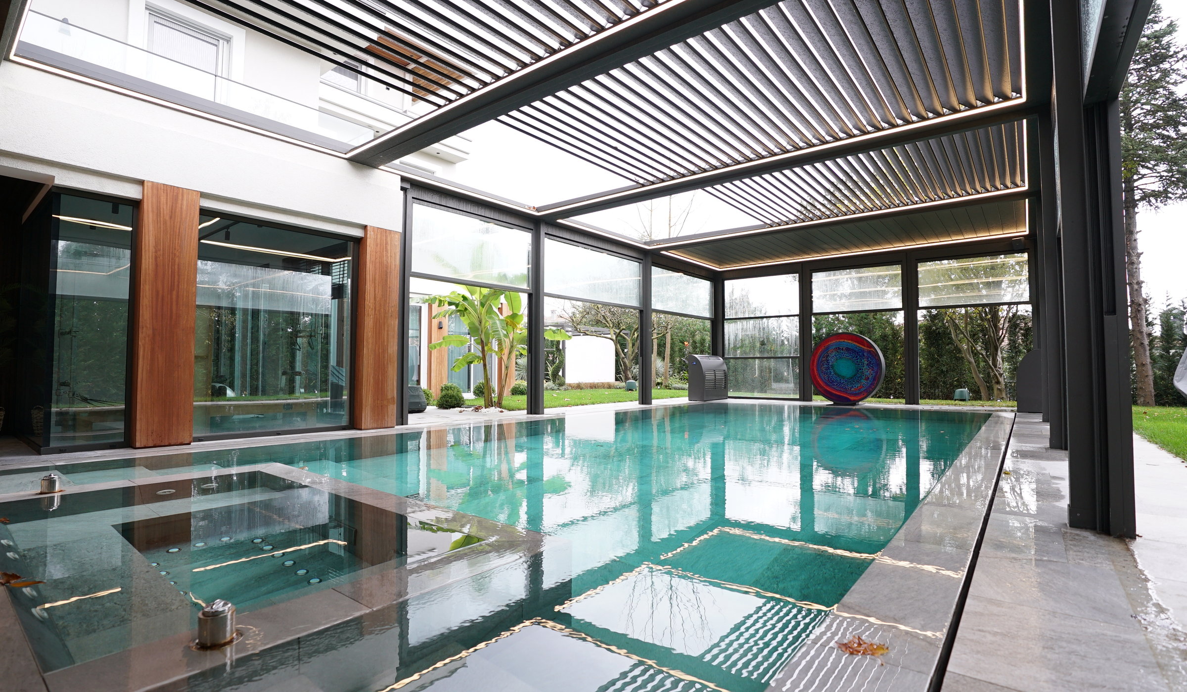 Kemer Country poolside pergola and glass system installation